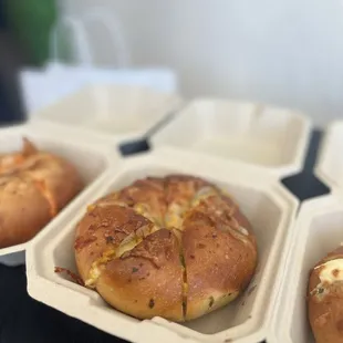 Front Row Left to Right: miso scallion, Classic, Jalapeño  Back Row Left to Right: hojicha einspänner, matcha einspänner, expresso
