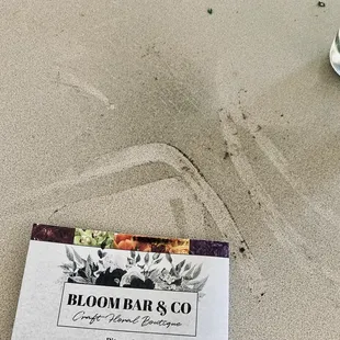 Black yuck that dripped from the arrangement. No clue what it is.