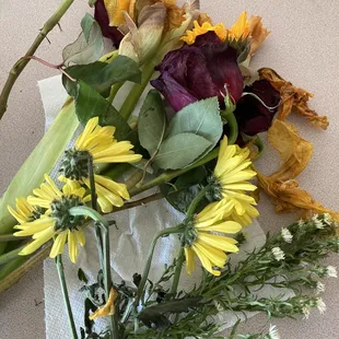 Dead flowers pulled from arrangement three days after delivery.