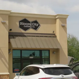 a car parked in front of the building