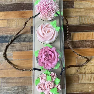 Our luxe box of 4 floral cupcakes will surely impress anyone who receives it.