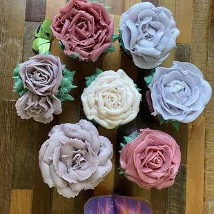 A &quot;boucake&quot; of classic rose floral cupcakes. These are examples of our intricate floral designs.