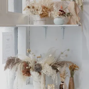 You can find a selection of one of a kind Everlasting floral arrangements in store.