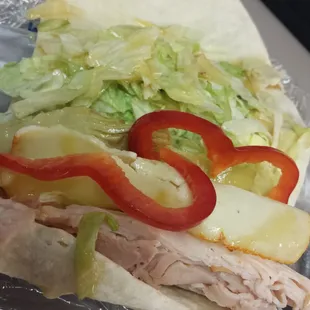 Inside the turkey chicken artichoke wrap (1/2)