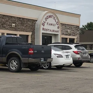 a truck parked in front of the restaurant