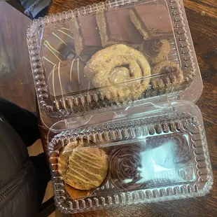 Orange roll, donuts, cashew bars. Hazelnut cookies, lemon poppyseed muffin, chocolate cupcakes