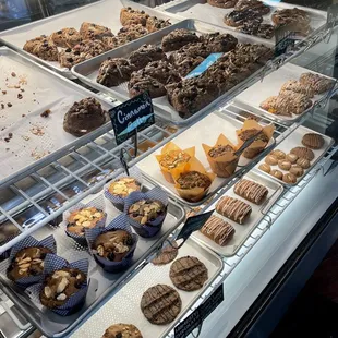 a display of cookies and pastries