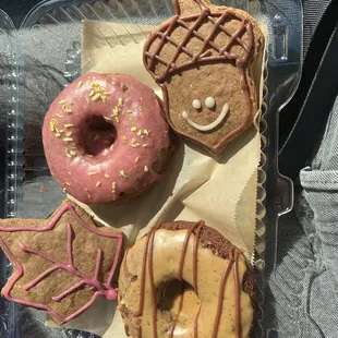 Lemon Raspberry Donut, Two iced cookies, and a maple donut