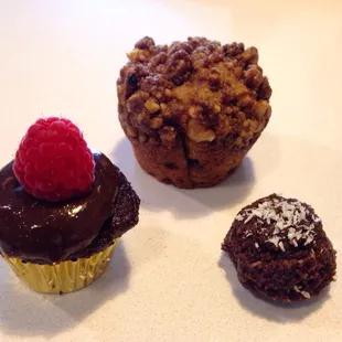 Mini chocolate brownie, apple streusel muffin and cashew truffle.