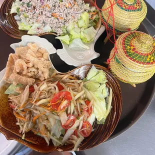 Larb Salad and Isann Papaya Salad pair with sticky rice