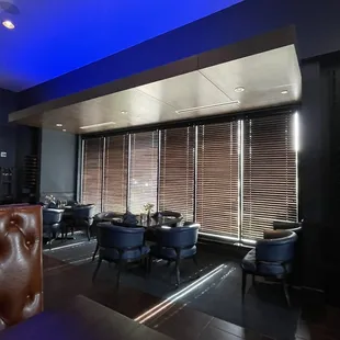 a dining room with blue lighting