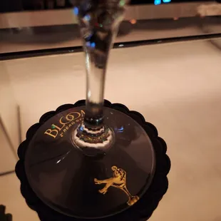 a glass of wine on a table