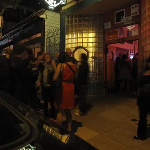 a crowd of people standing outside