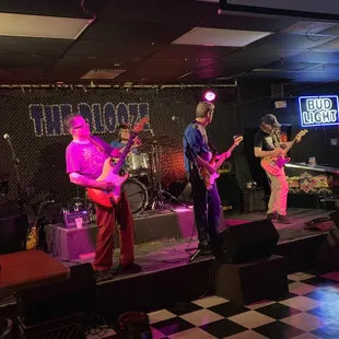 a band performing on stage