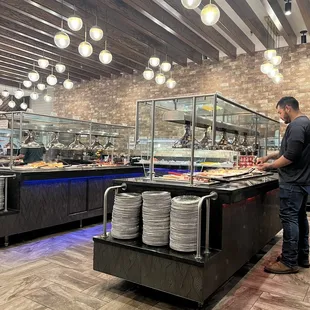 a man preparing food in a restaurant