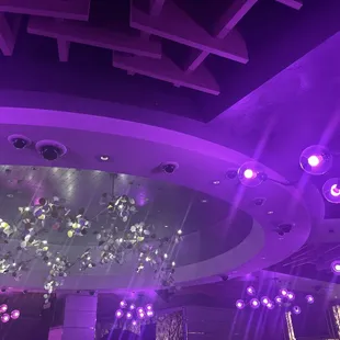purple lighting and chandelier