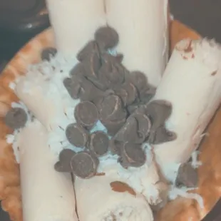 Vegan Irish overran with chocolate chip, coconut flakes and almonds in a waffle cup.
