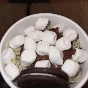 Matcha Melody Ice Cream with Oreos instead on strawberries, topped with marshmallows, Nutella &amp; an Oreo.
