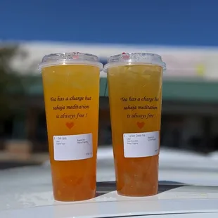 two glasses of orange juice