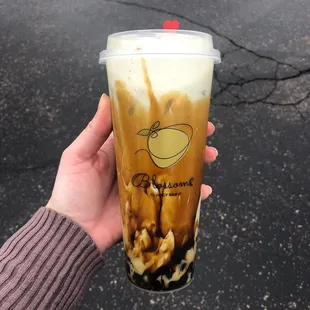 Matcha milk tea with tiger syrup and regular boba