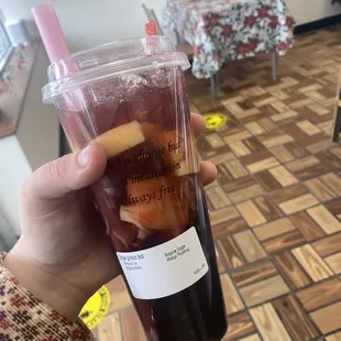 Grape green tea with boba and mango pudding