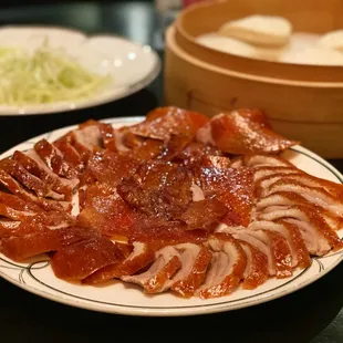 The star of the night, the peking duck. Love that they used the traditional drip method.