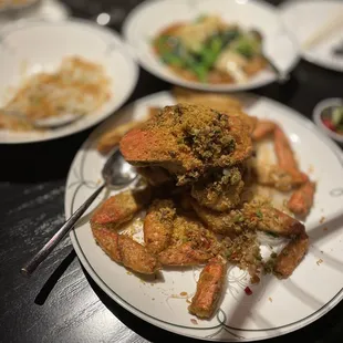 crab legs on a plate with a fork