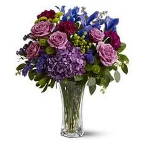 vase of purple and purple flowers