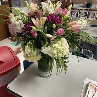 What I received. Plain glass vase, plain colored flowers.