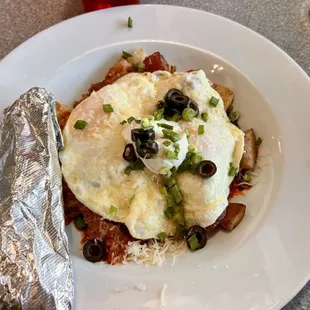 Chorizo bowl with corn tortillas eggs over medium