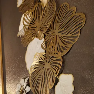 a close up of a wall decoration