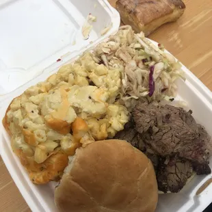 Brisket, macaroni and cheese, coleslaw, cornbread