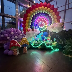 Rainbow balloon display with LED lights. specialty custom balloon display/ backdrop