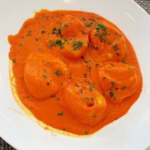 a plate of food with tomato sauce