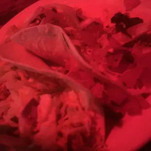 a plate of food with a red light