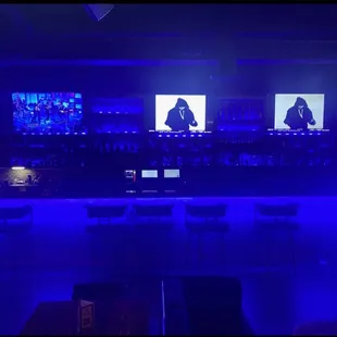a bar with blue lighting