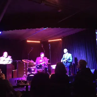  a band performing on stage