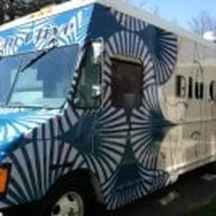 a blue and white food truck