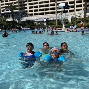 Spacious pool with palm trees