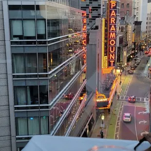 View, from our table, of Washington Street and the Paramount Theater, f