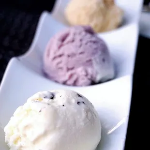 Housemade Gelato Trio (front to back): Stracciatella, Berry Mascarpone, and Peanut Butter ($10).