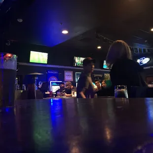 people sitting at the bar