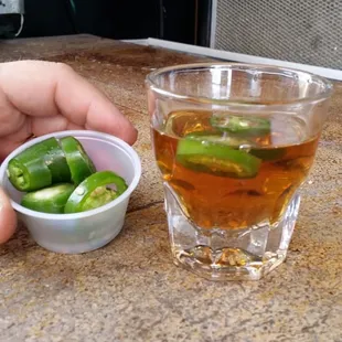 Fresh cut jalapenos and whiskey.