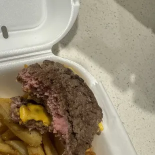 Burger that was supposed to be well done.