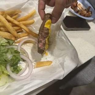 Burger that was supposed to be well done.