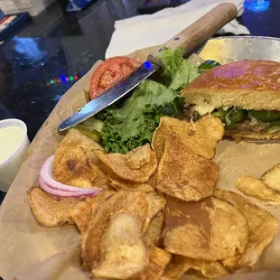 Hot Burger well done and house made chips.