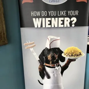 a dachshund holding a plate of food