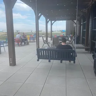 Come and enjoy swings and fireplaces on the rooftop patio.