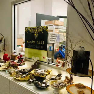 a buffet table with a variety of desserts