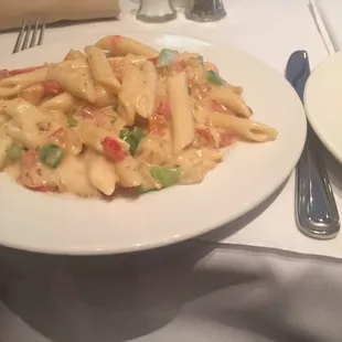 a plate of pasta and vegetables